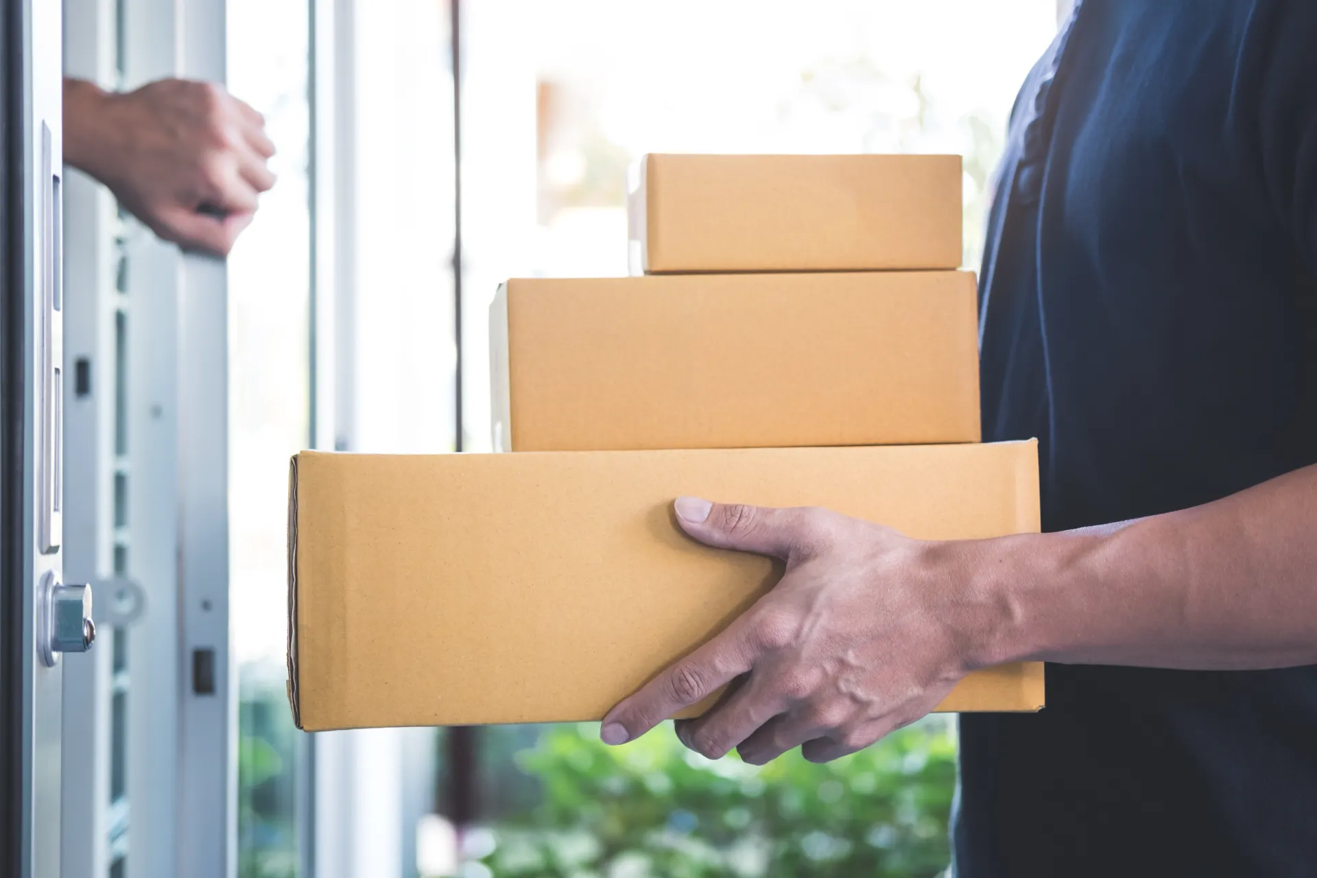 Woman receiving a discreet delivery at home